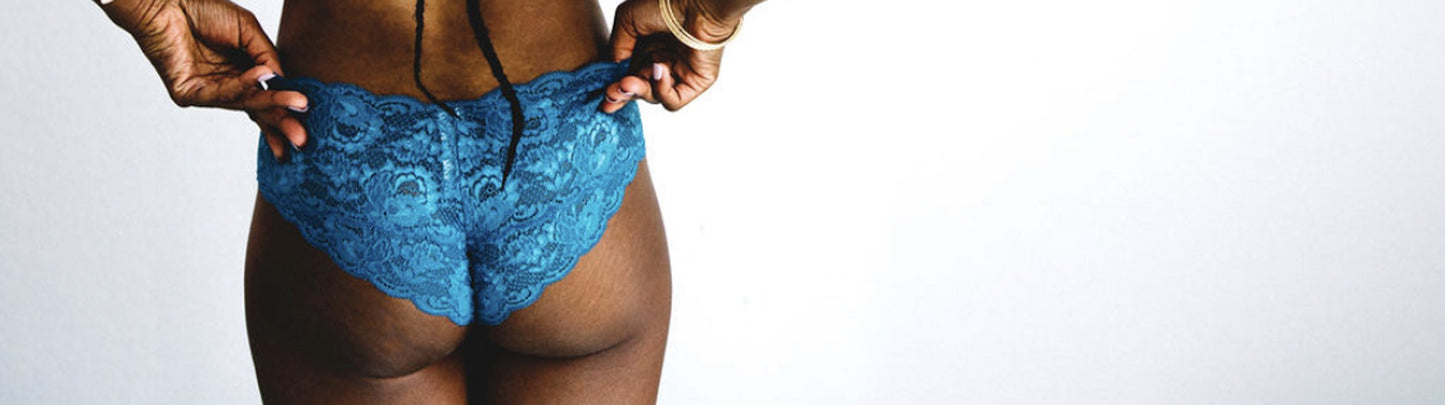 A backside shot of a cheeky pair of lace underwear. Find lace bikinis, briefs and thongs at Forty Winks
