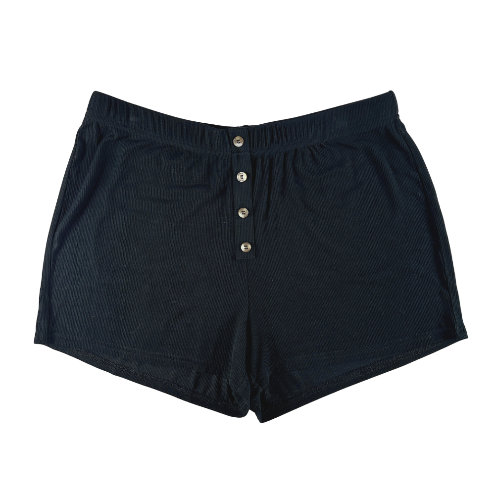 Black shorts with button fly on a white background