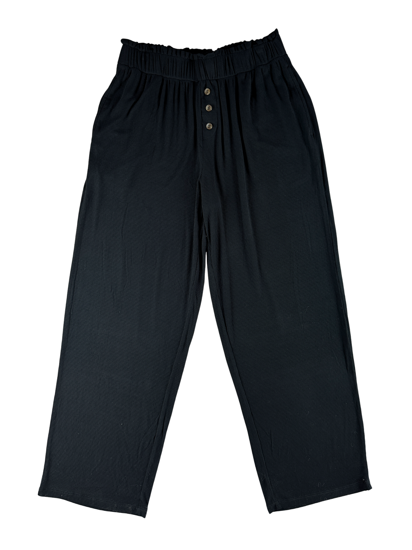 Black pants with a button fly on a white background