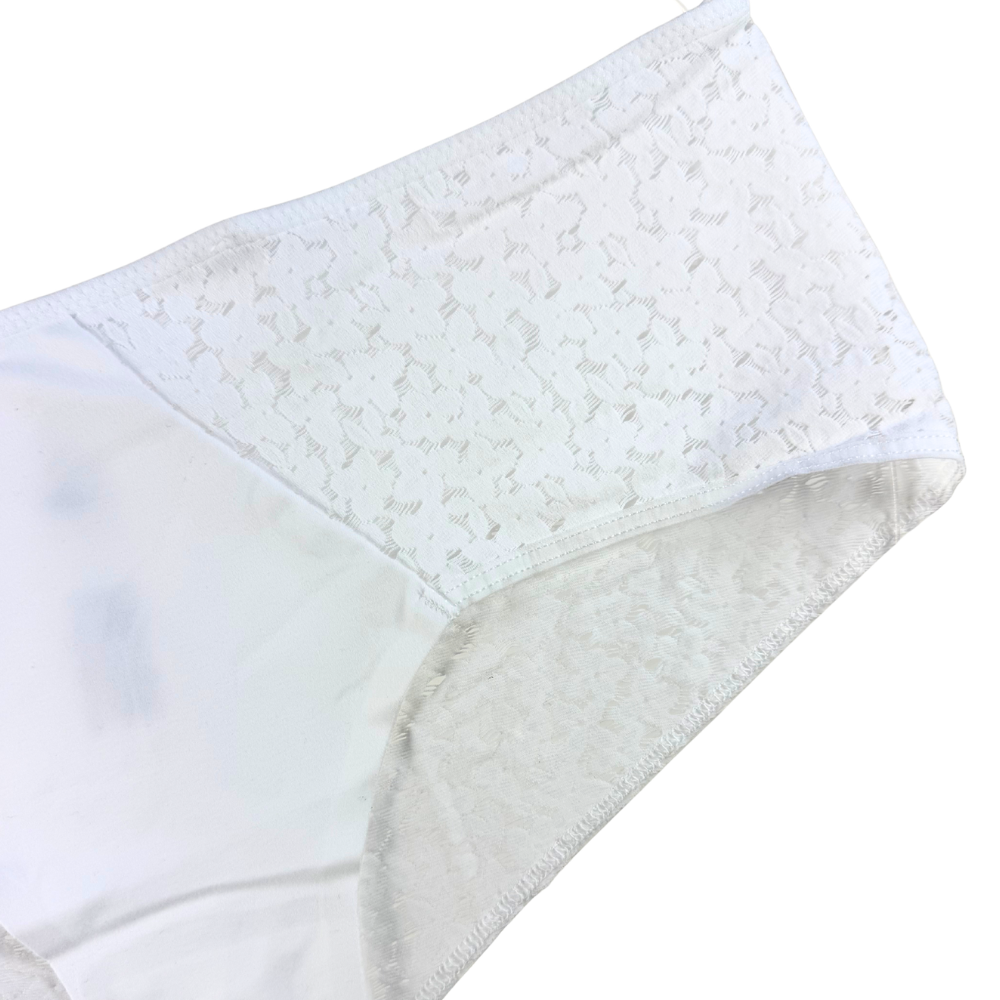 Close-up of a white textured pillow on a white background