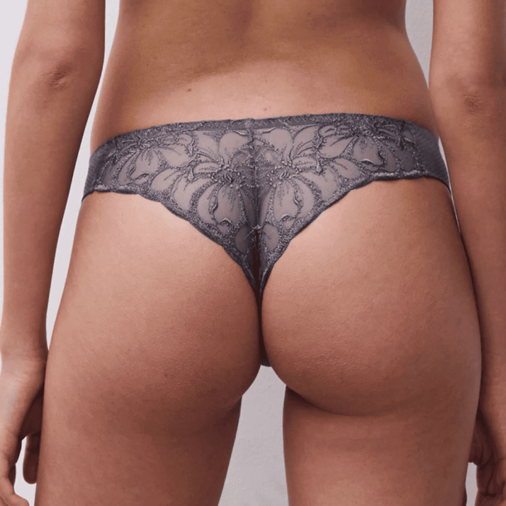 Chantelle Fleurs thong in grey stardust, back view on a model, close-up.