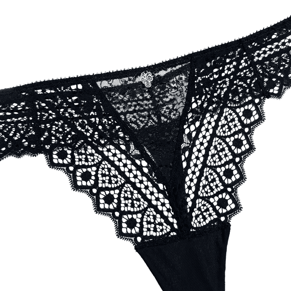 Empreinte cassiopee thong in black, white background, close-up.