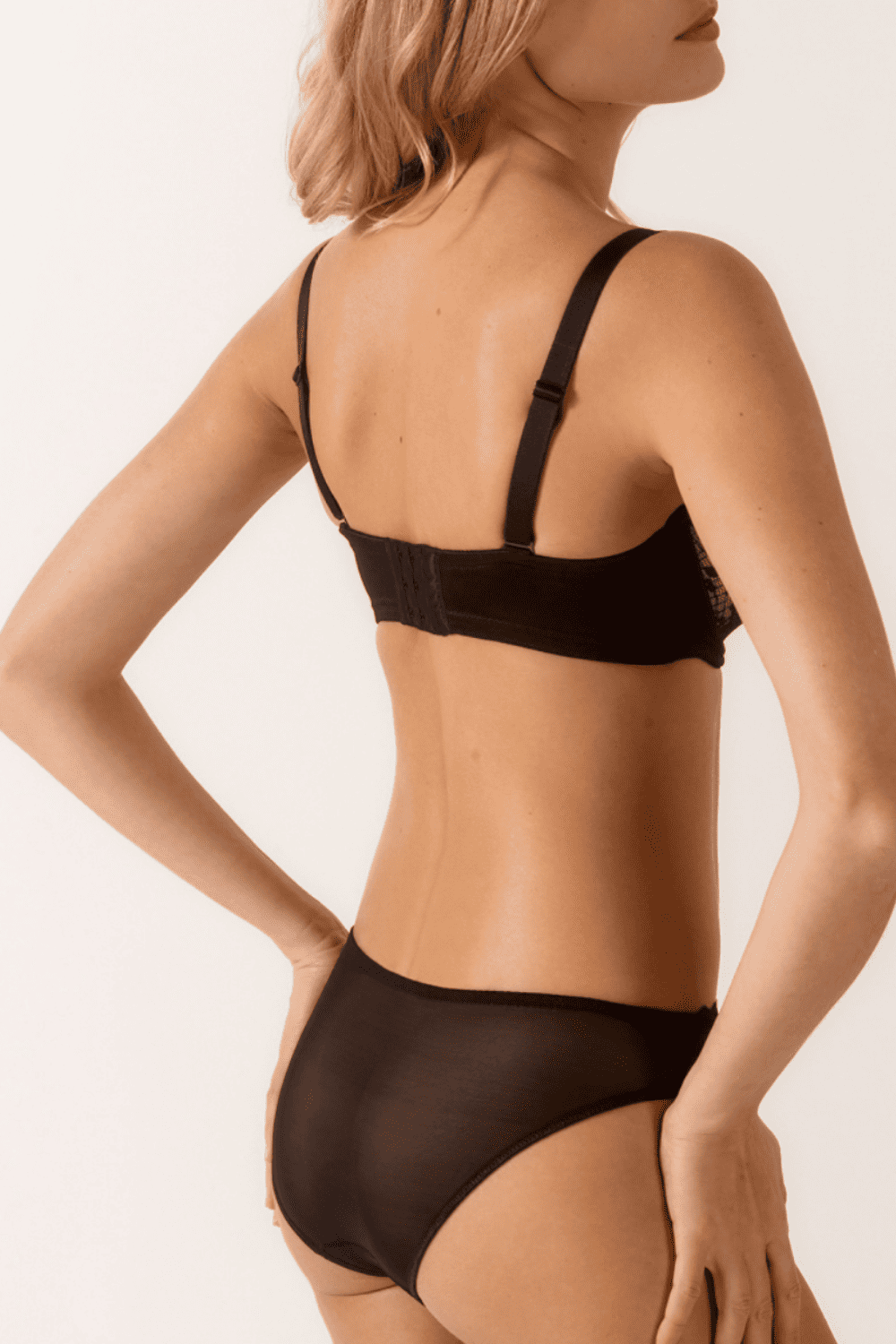 Empreinte melody brief in black, a model back-side view, close-up.