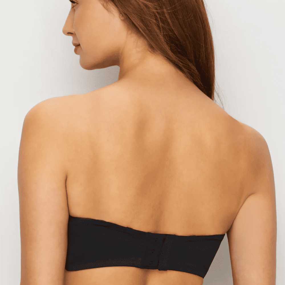 Fantasie aura strapless bra in black on a model back view, close-up.