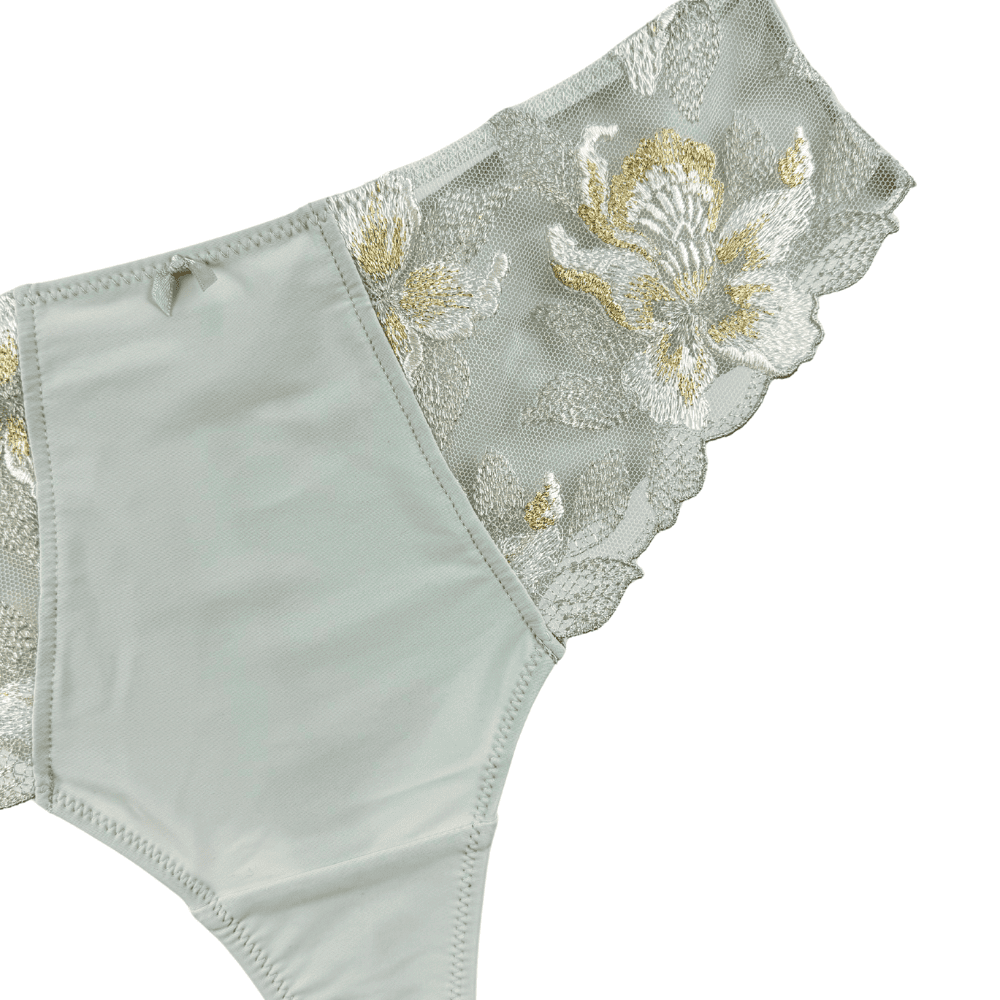 Fantasie magdalena thong in vintage green on a white background, close-up.