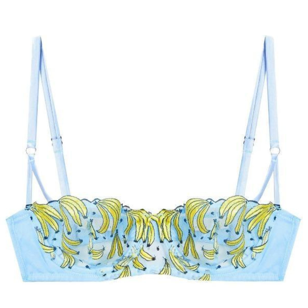 Light blue bikini top with banana print on a white background