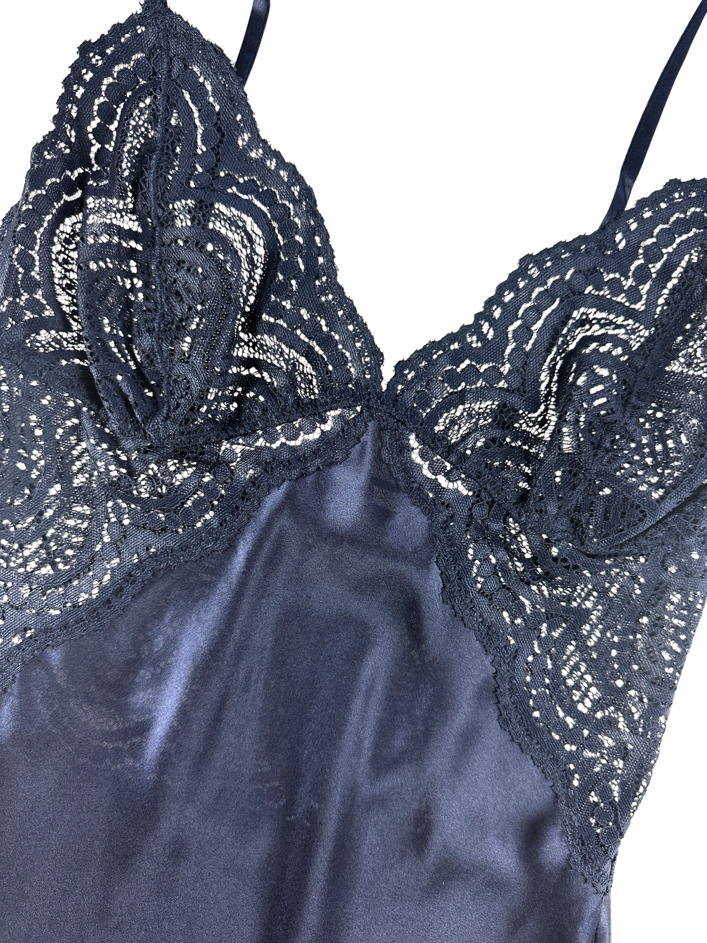 Close-up of a dark gray lace camisole top with thin straps and a satin-like body, shown against a plain white background.