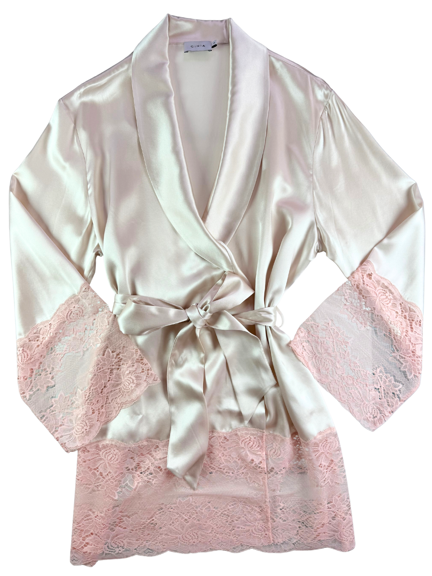 White satin robe with pink lace trim on a white background