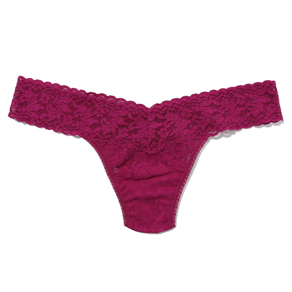 Pink lace thong on a white background