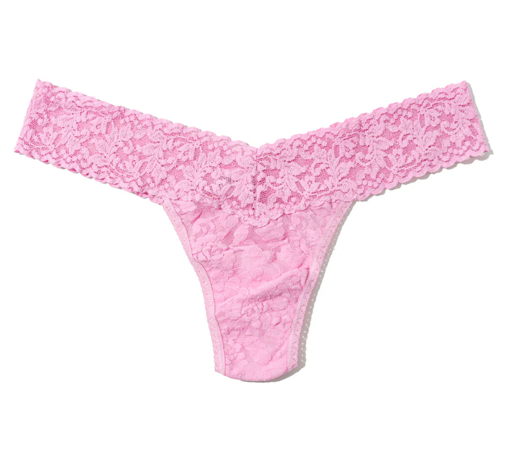 Pink lace thong on a white background