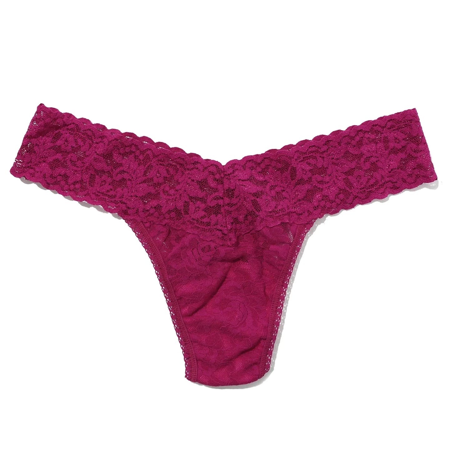 Pink lace thong on a white background