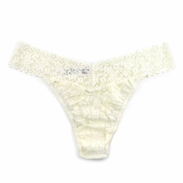 white lace underwear against a white background