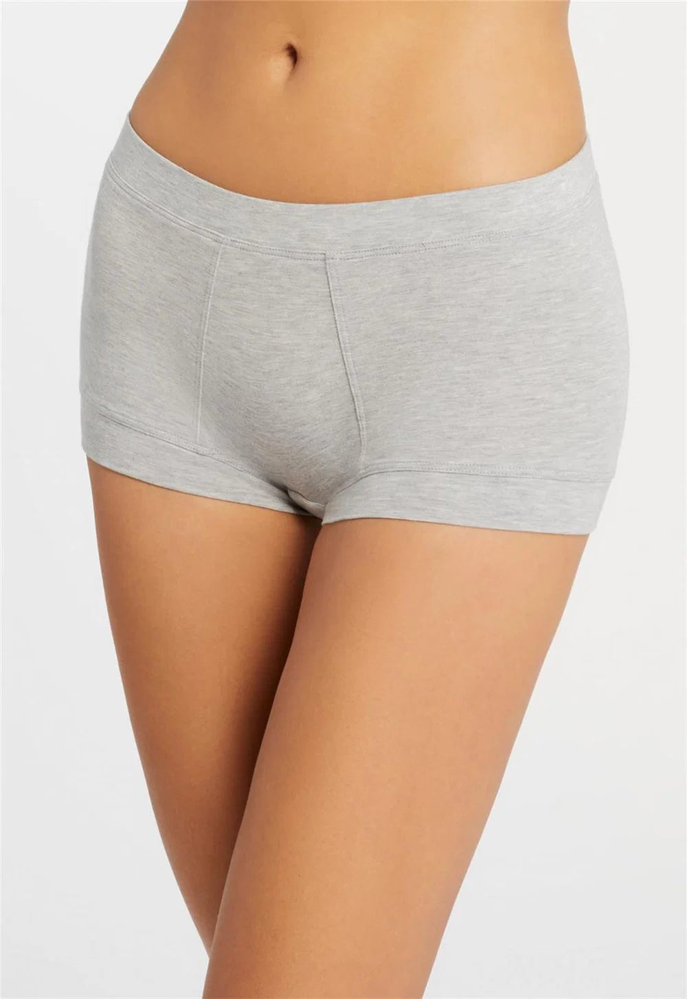 Gray boxer briefs worn by a person on a light gray background