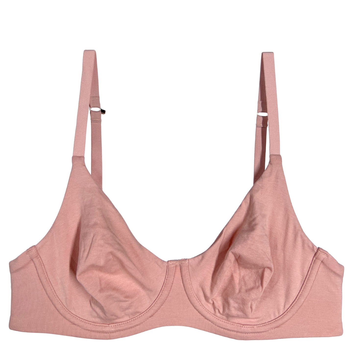 Pink bra on a white background