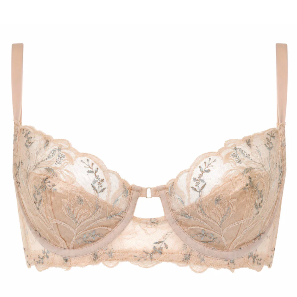 Beige bra with floral embroidery on a white background