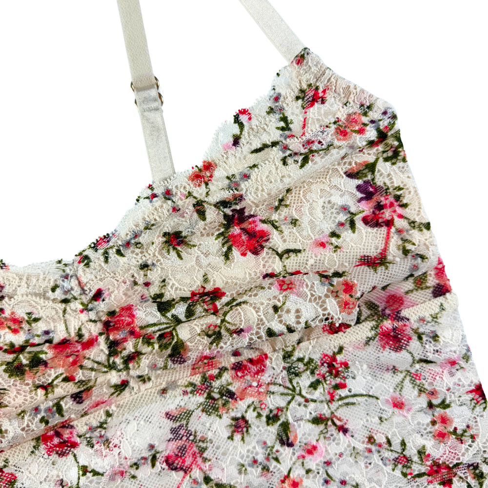 Floral lace top with red flowers on a white background