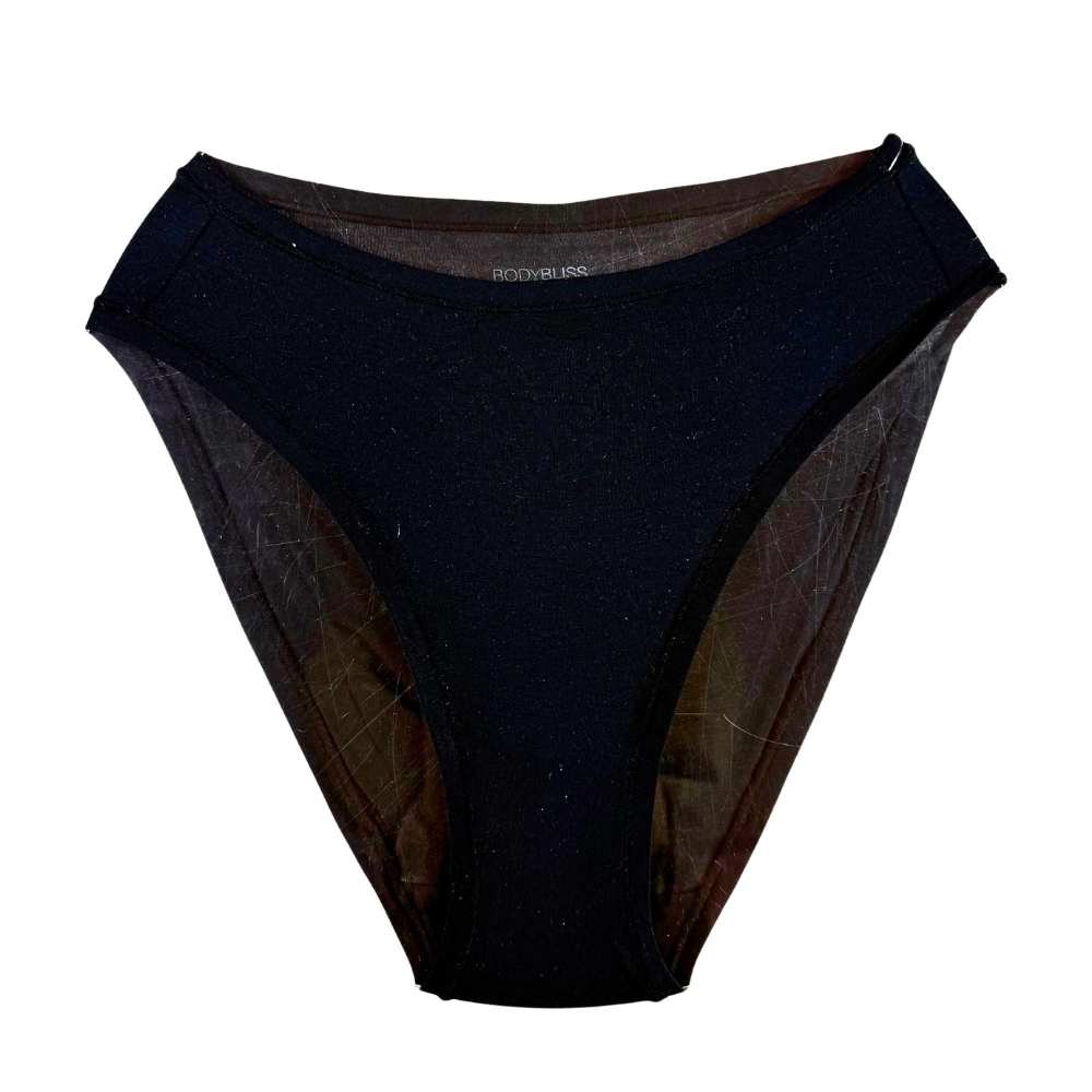 Black sheer mesh bikini bottom with a solid black front panel, photographed flat against a white background.