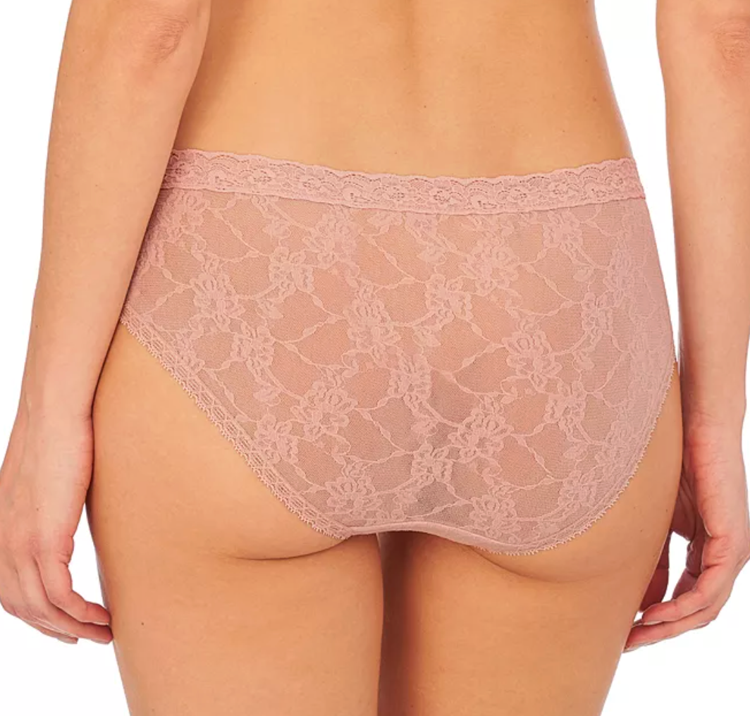 Rear view of a model wearing a dusty rose lace high-waisted brief, showing the floral lace pattern and waistband against a white background.