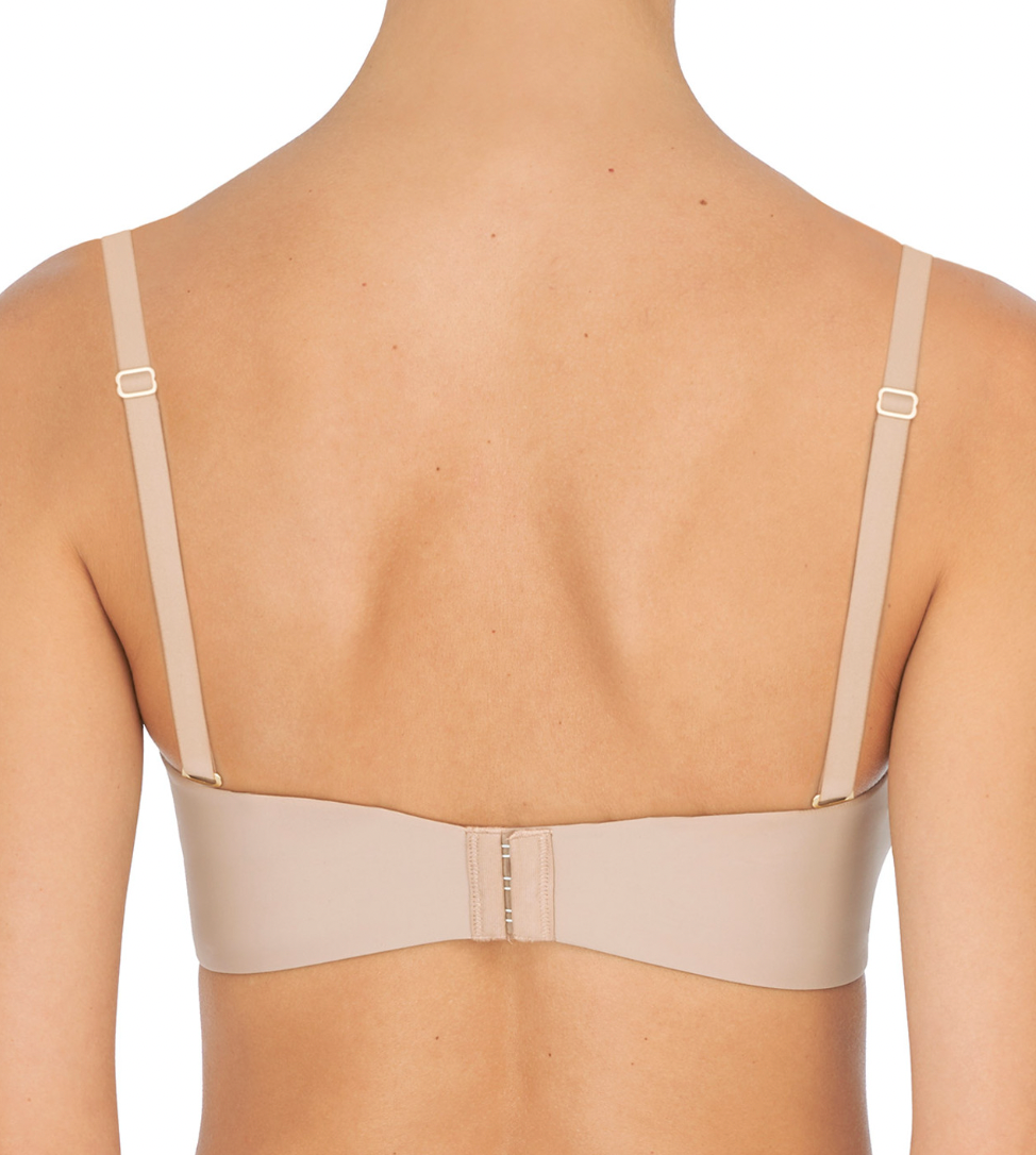 Beige bra on a mannequin with a white background