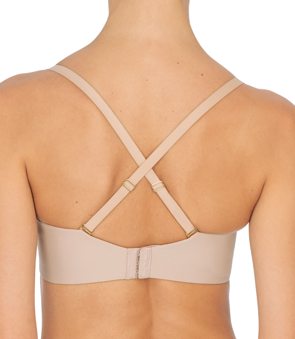 Beige bra on a mannequin with a white background