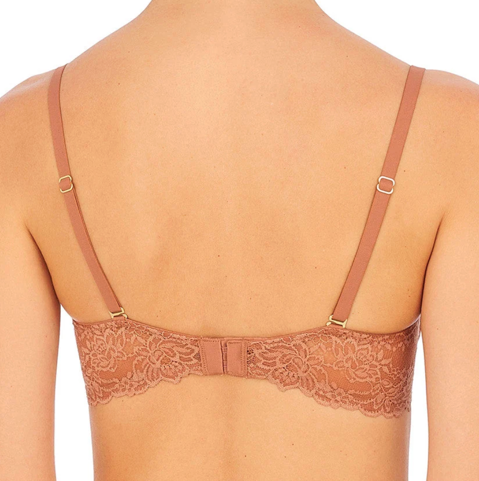 Tan lace bra on model, back view