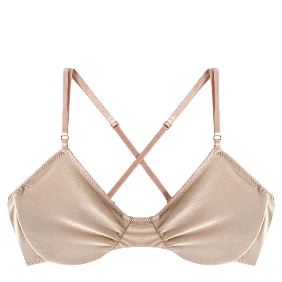Beige bra with thin straps on a white background