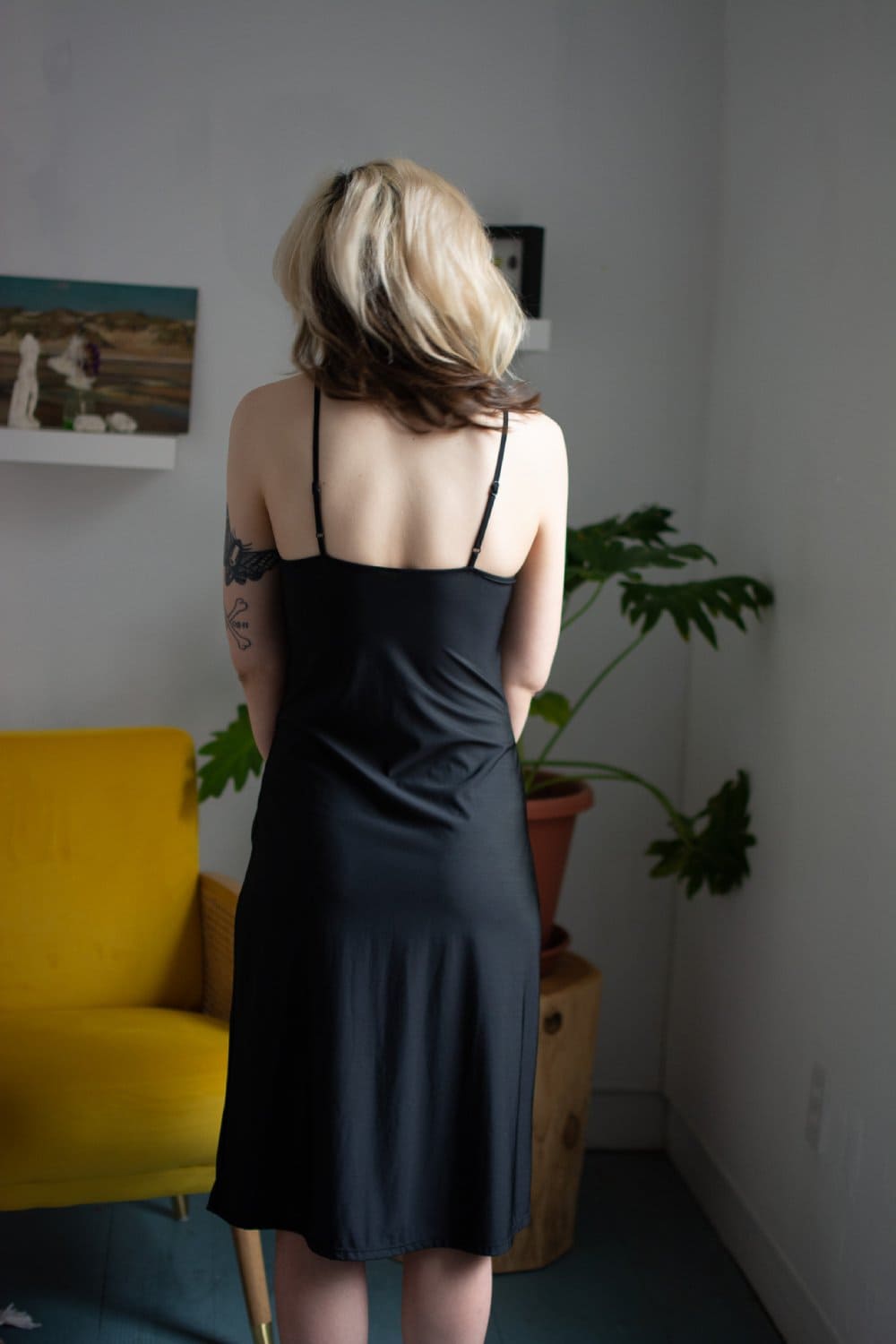 Only hearts second skin long full slip in black, back view on a model.