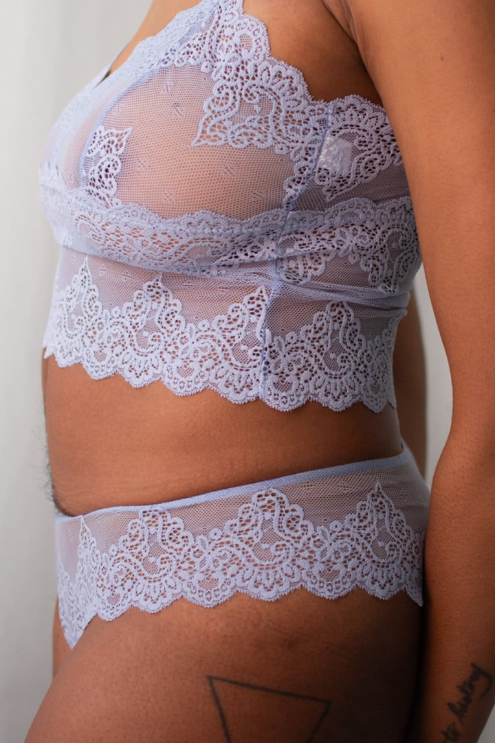 Only hearts so fine lace cami in cascade, side view on a model, close-up.