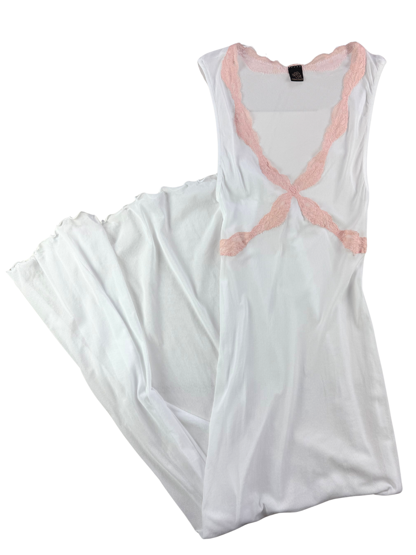 White nightgown with pink lace details on a white background