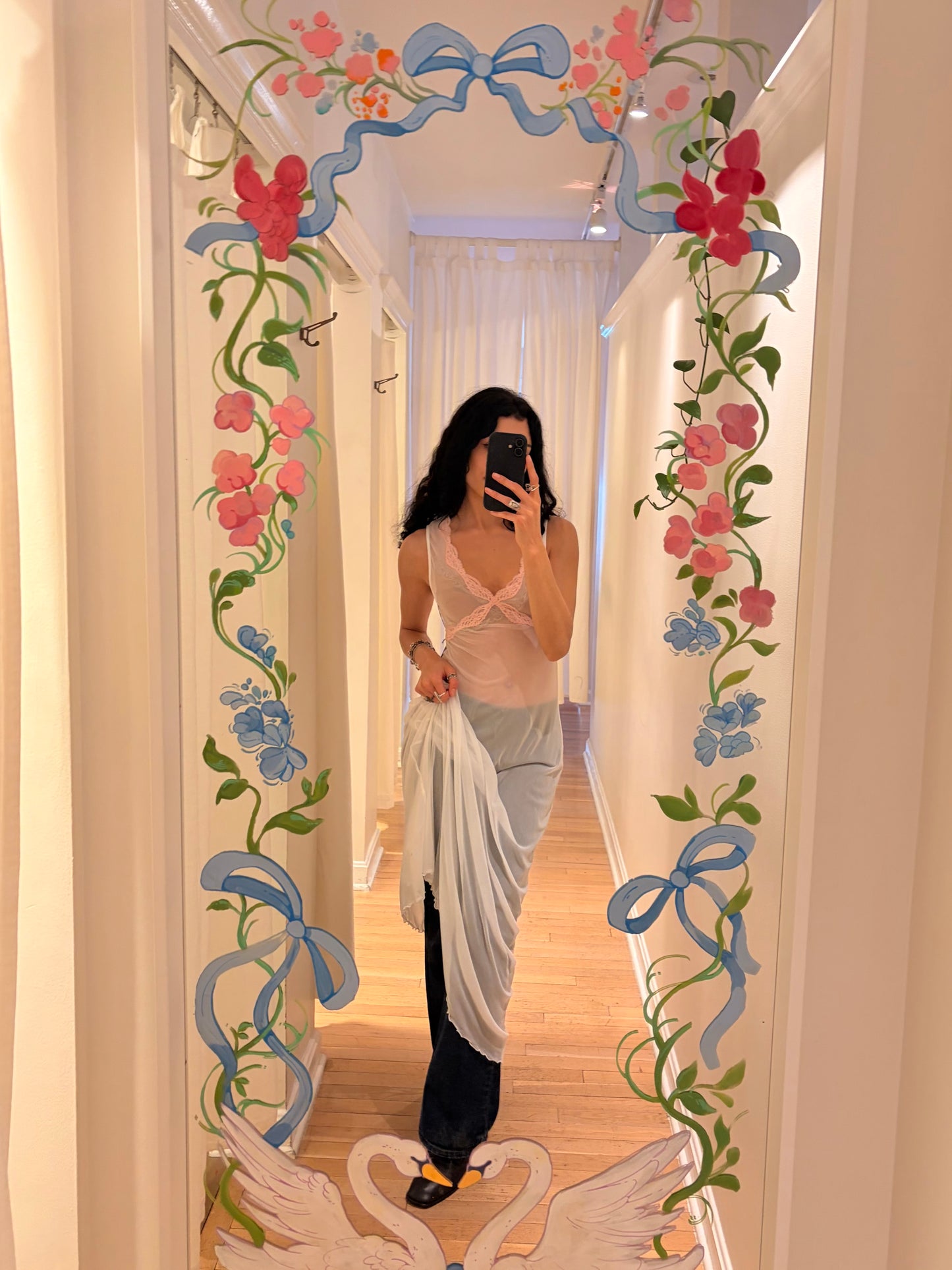 woman in dress in mirror