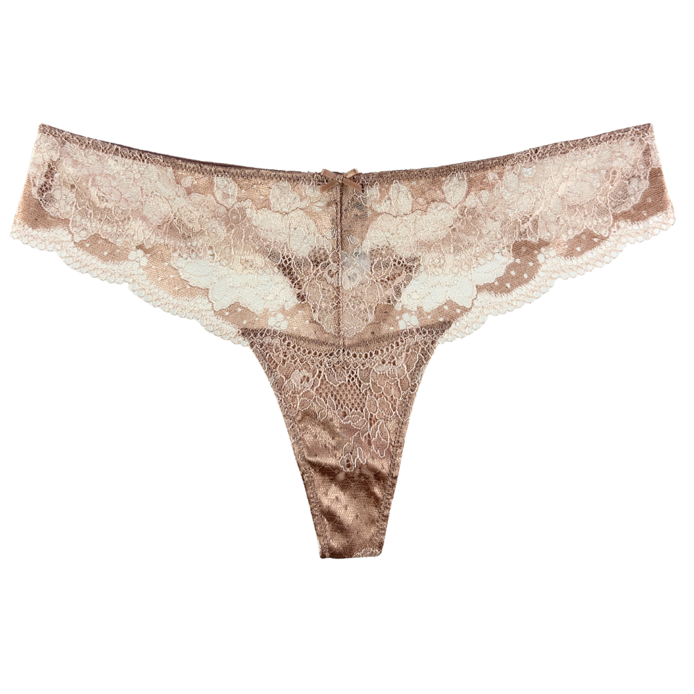 A pair of women's lace thong panties in a champagne beige and rose gold color, featuring a wide scalloped lace waistband and a sheer mesh thong body, shown against a plain white background.