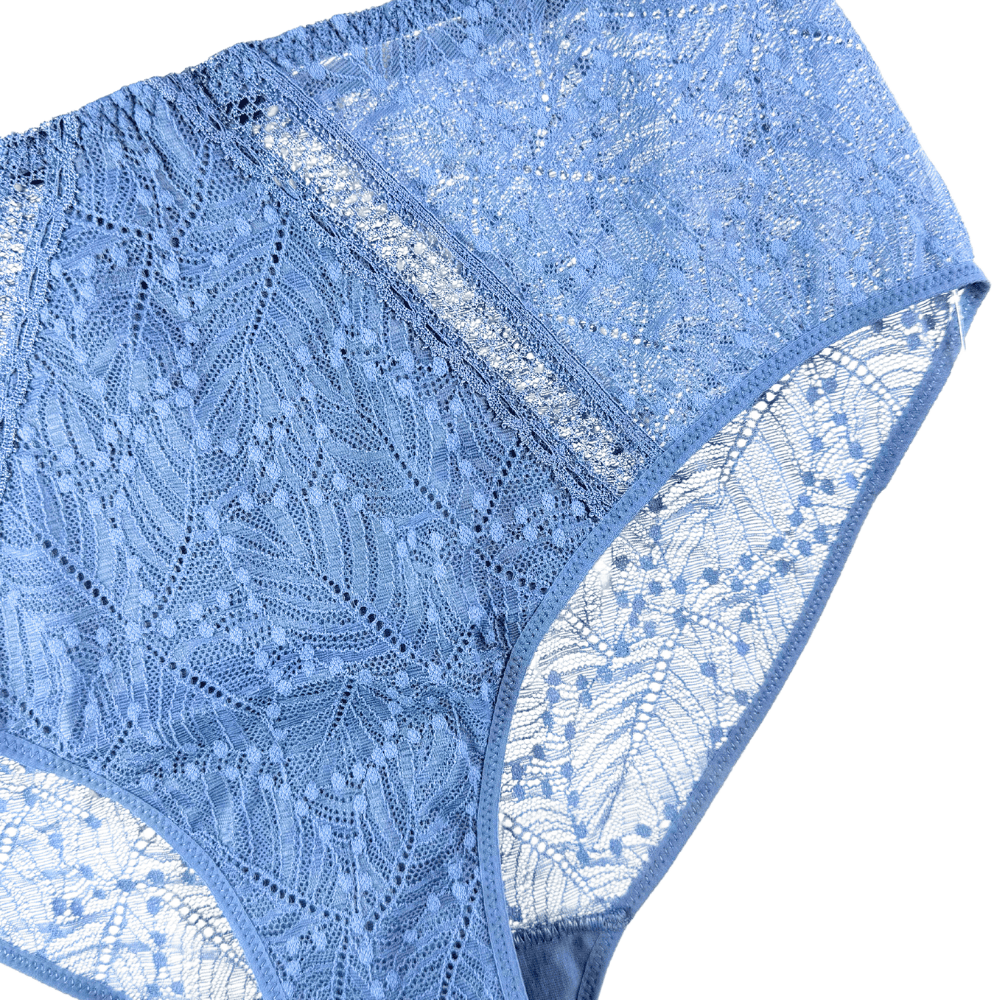 Simone Perele Comete culotte high-rise in blue chambray, close-up, top view on a white background.