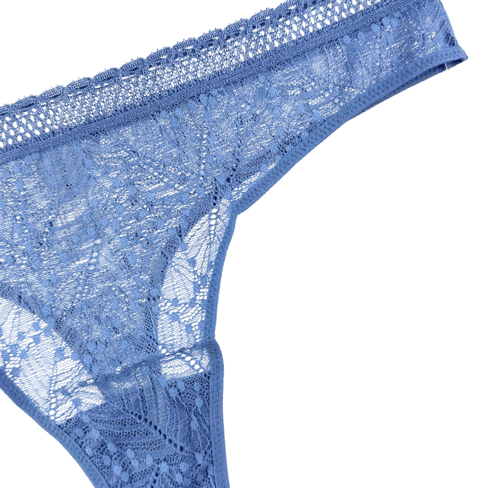 Simone Perele Comete tanga in blue chambray, front-side view, close-up on a white background.