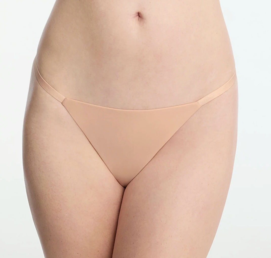 beige thong on model front