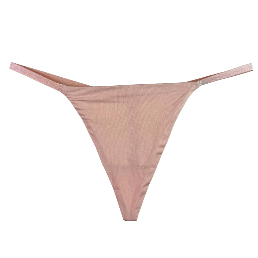 A light pink ribbed thong bikini bottom with thin side straps, shown flat against a solid white background.