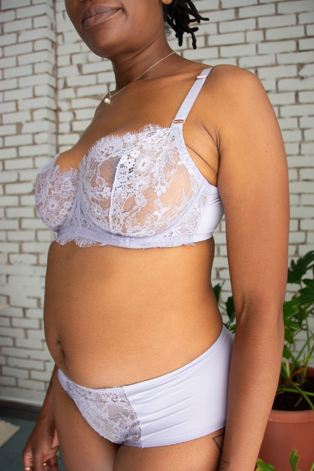 Skarlett blue entice balconette bra in lavender dusk, front-side view on a model, close-up.