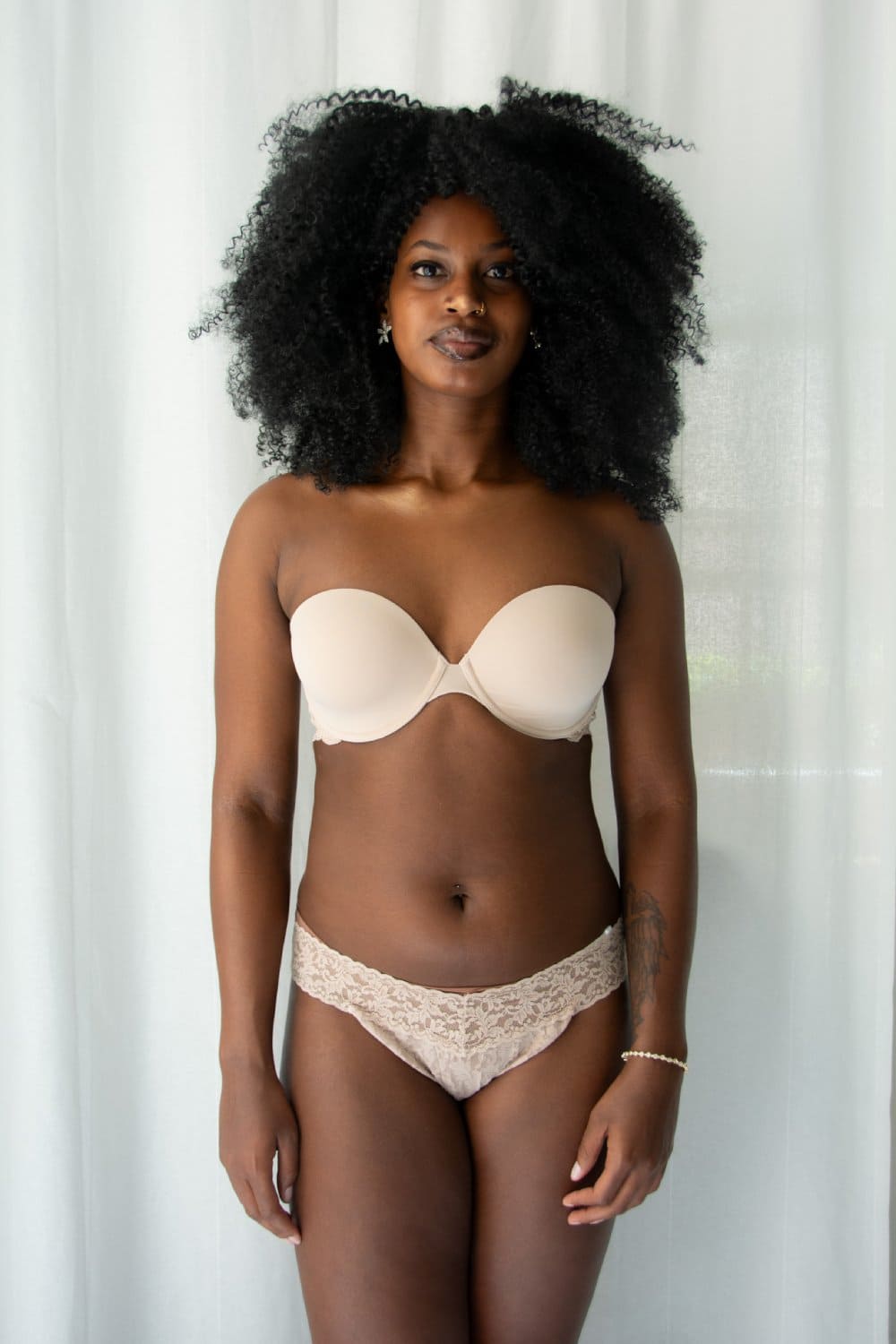 Skarlett Blue Goddess Multiway Strapless Bra in Cashmere, front view on a model.