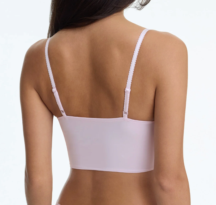 back of pink bra on model