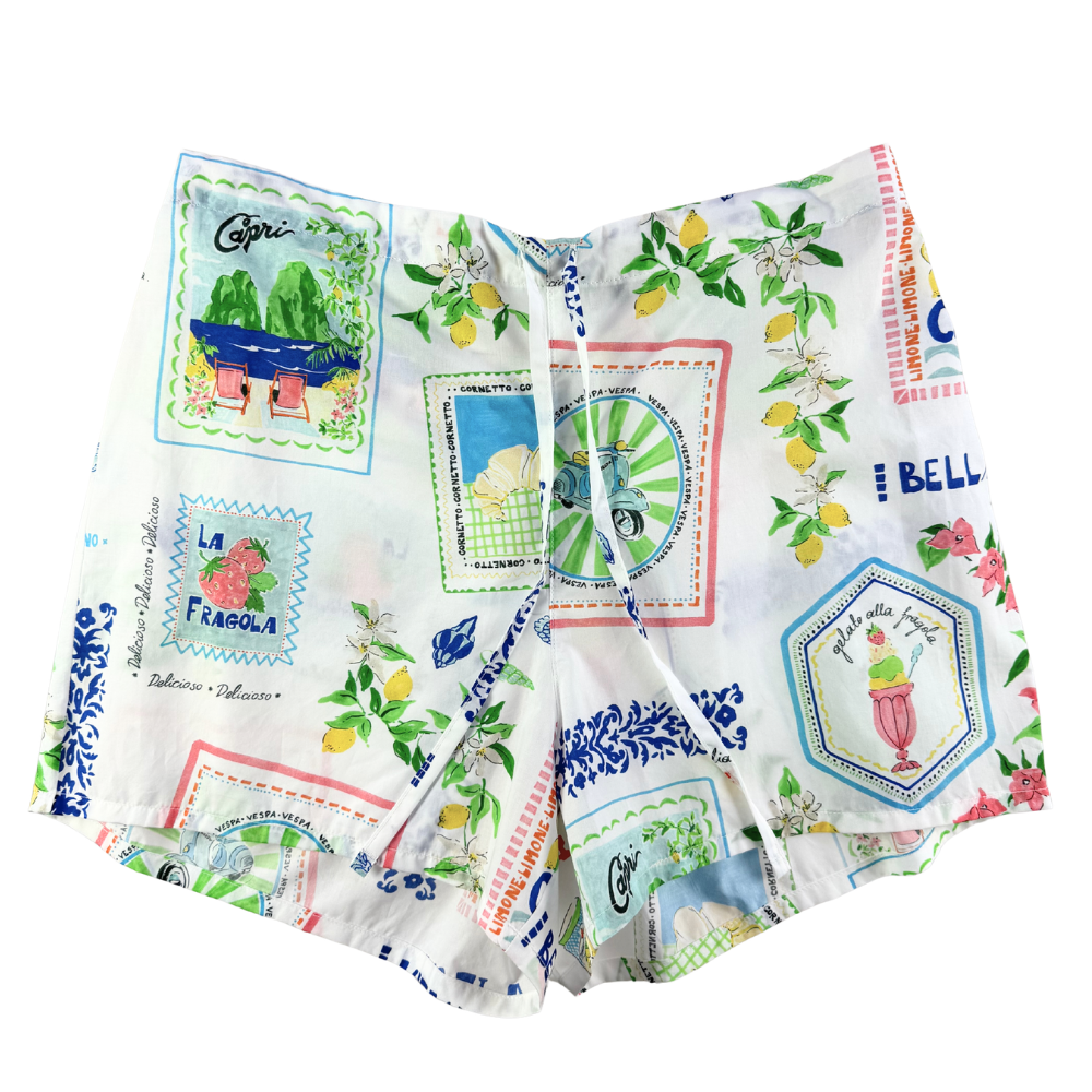Colorful patterned shorts with vintage-style graphics on a white background