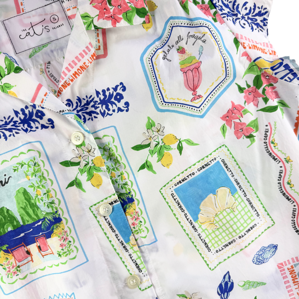 Colorful patterned pajamas with vintage-style graphics on a white background