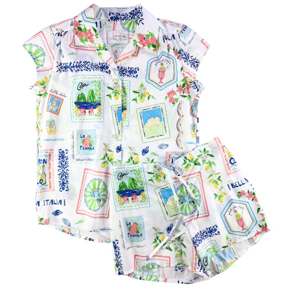 Colorful patterned shirt with various designs on a white background