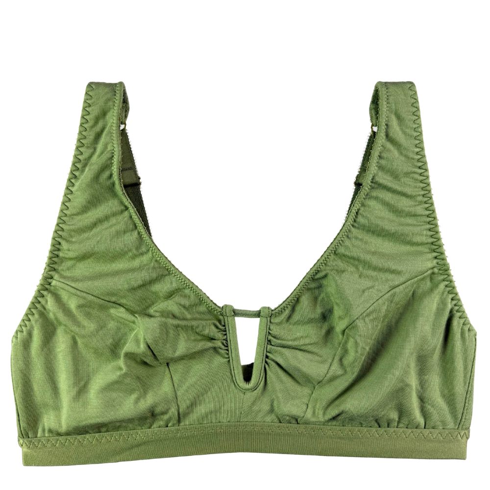 Green bra against white background.