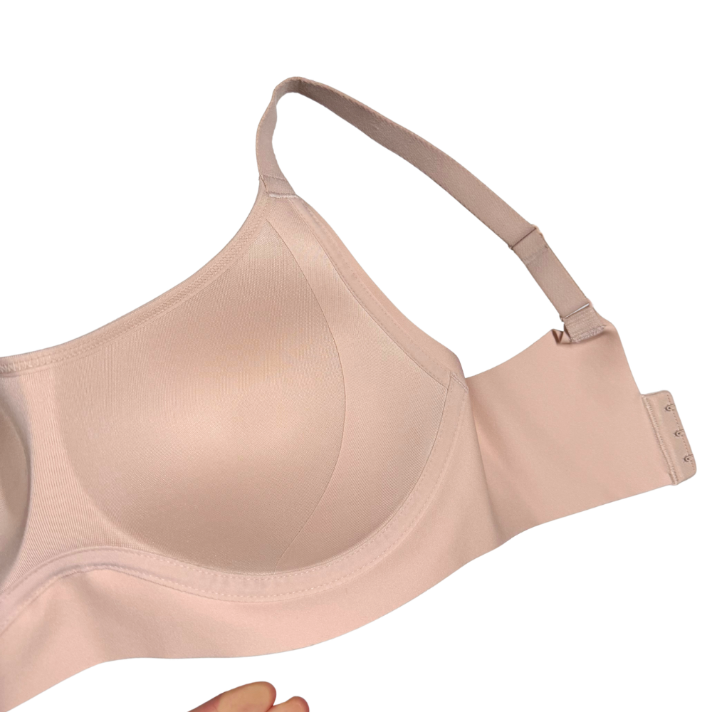 Beige bra on a white background