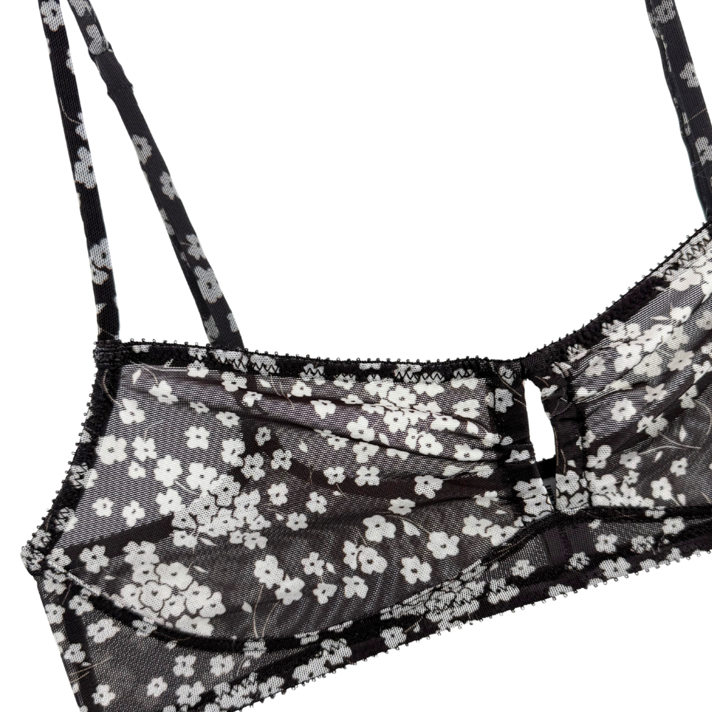 Black floral lingerie set on a white background
