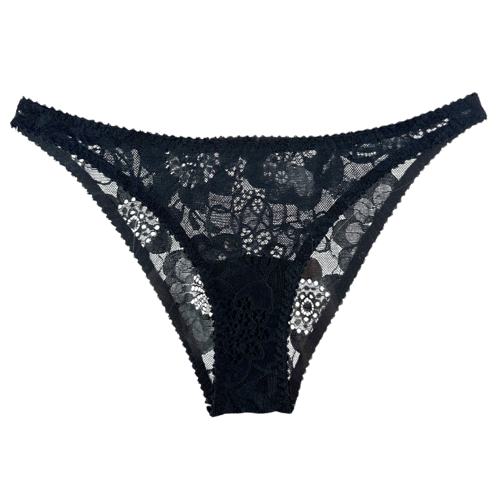 Black lace thong underwear with floral lace patterns and scalloped edges, shown flat against a white background.