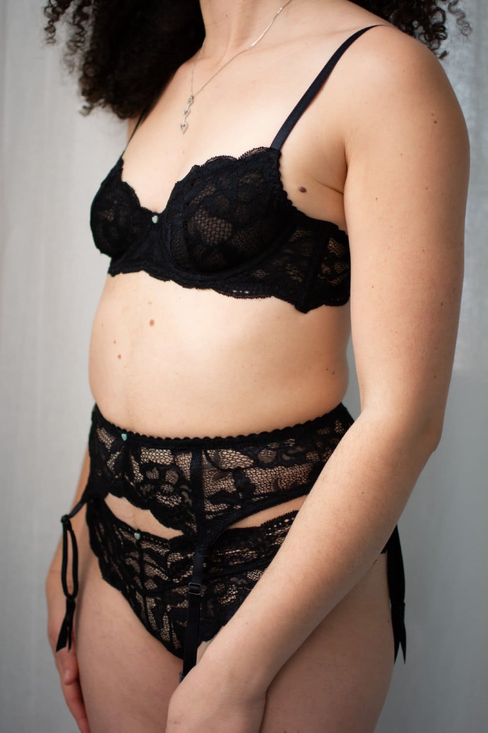 Clo intimo fortuna demi underwire bra in black, front-side view on a model, close-up.