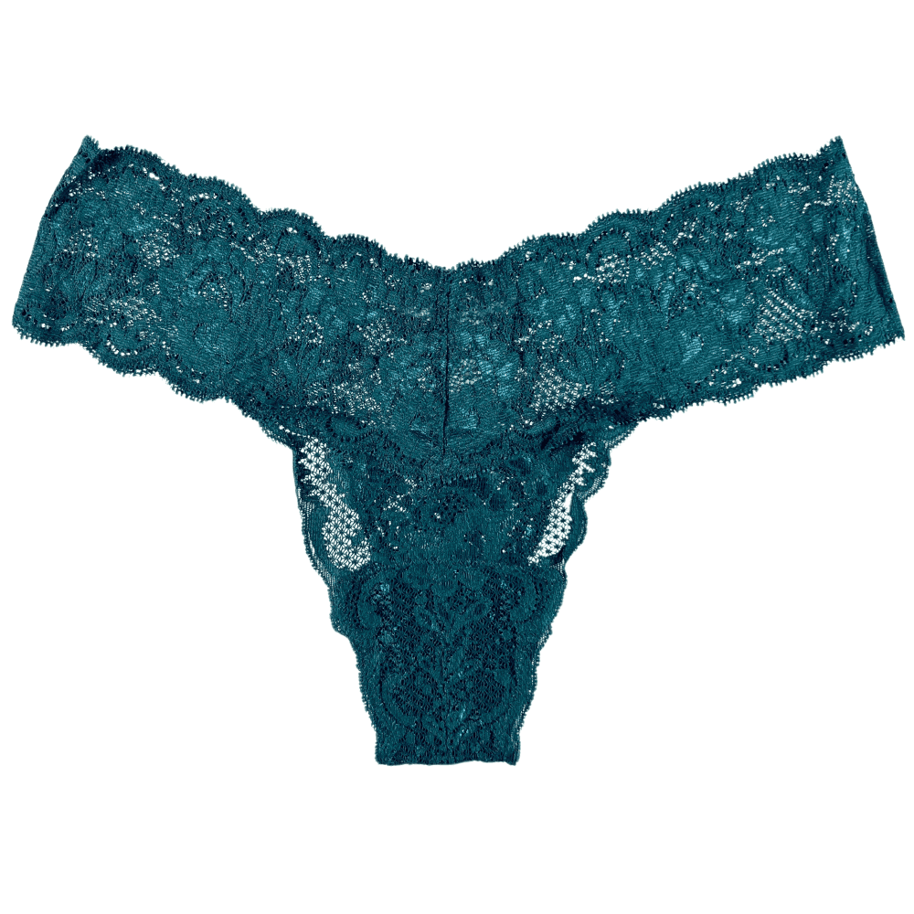 Green lace thong against white background