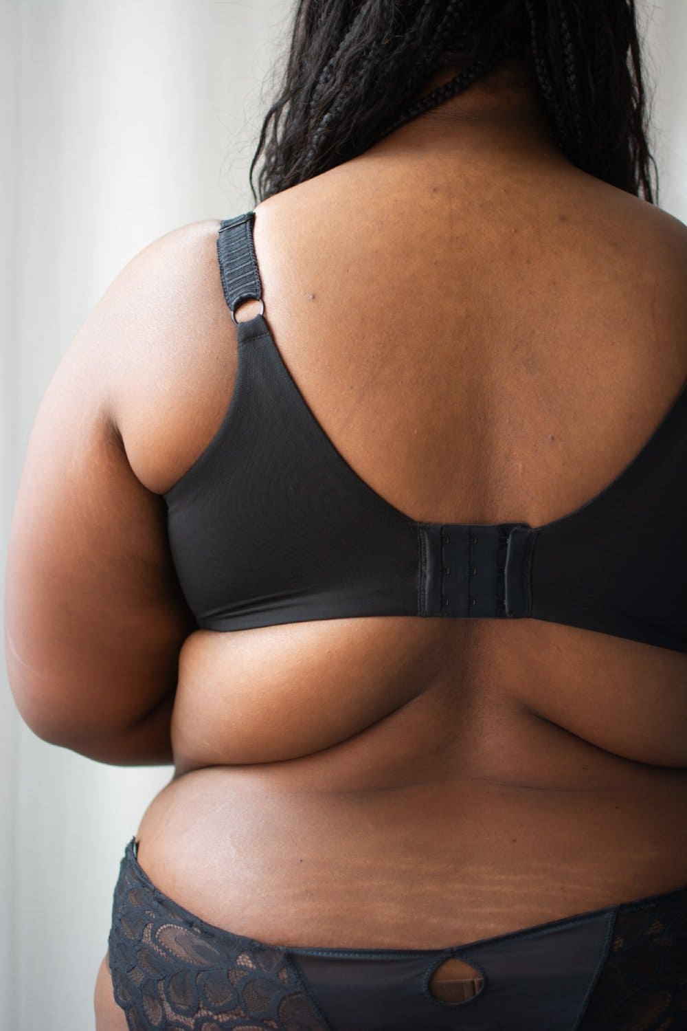 Elomi cate allure underwire bra in black, back view on a model, close-up.