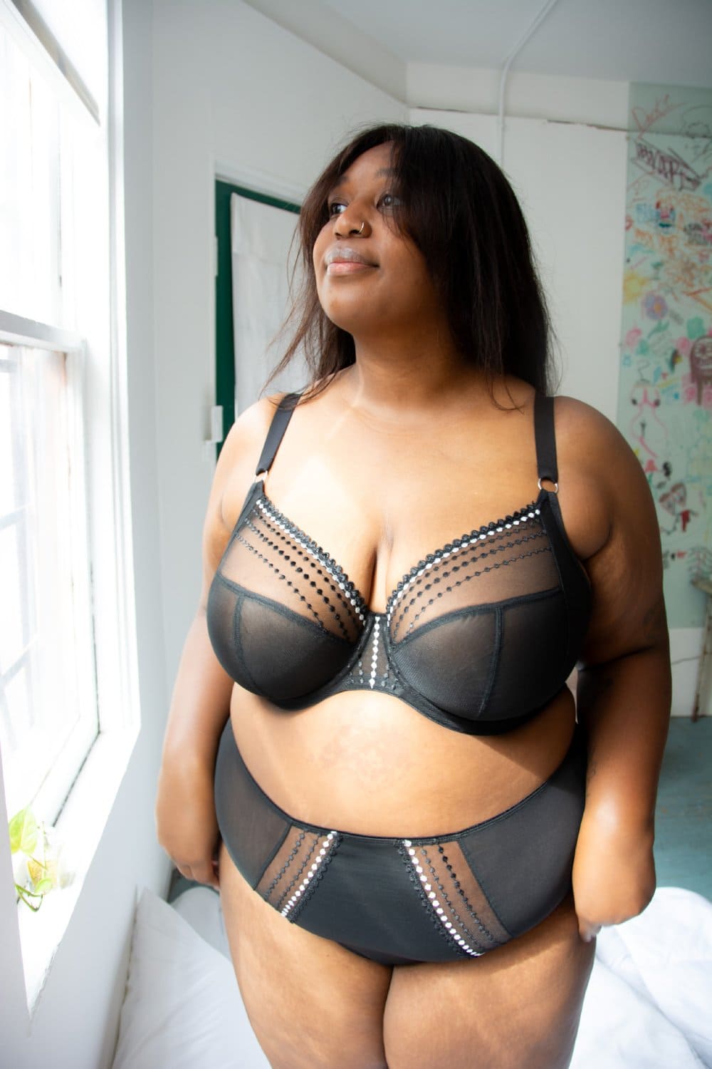 Elomi matilda plunge bra in black, front view on a model.