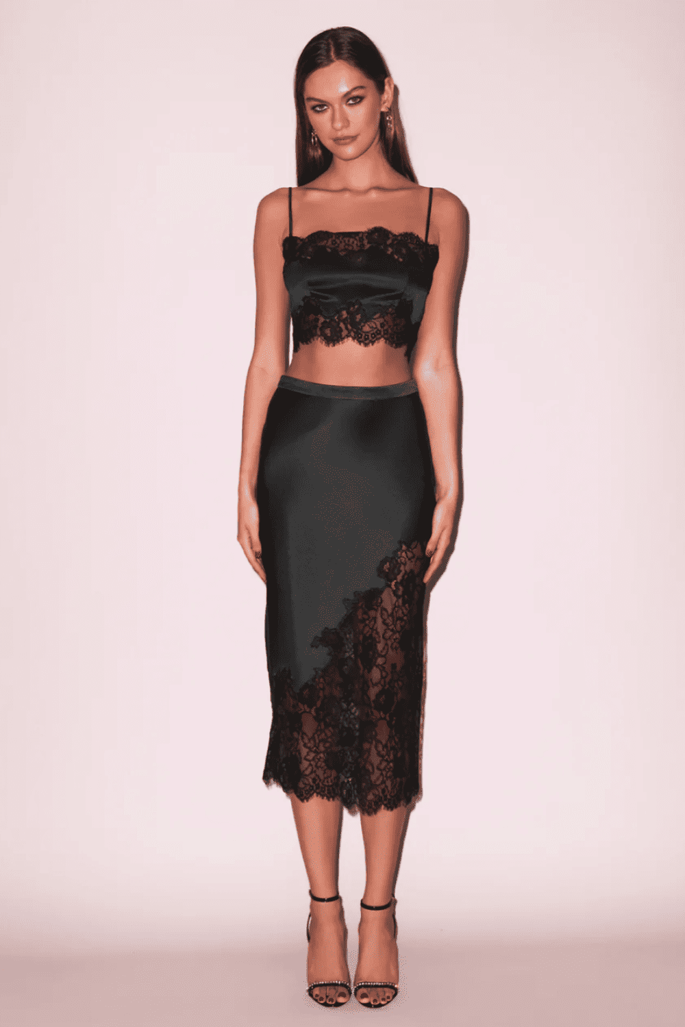 Fleur du mal silk and lace bandeau top in black, front view on a model.